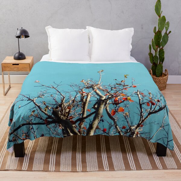 Item preview, Tree branch and orange autumn leaves with blue sky designed and sold by Mrvell.