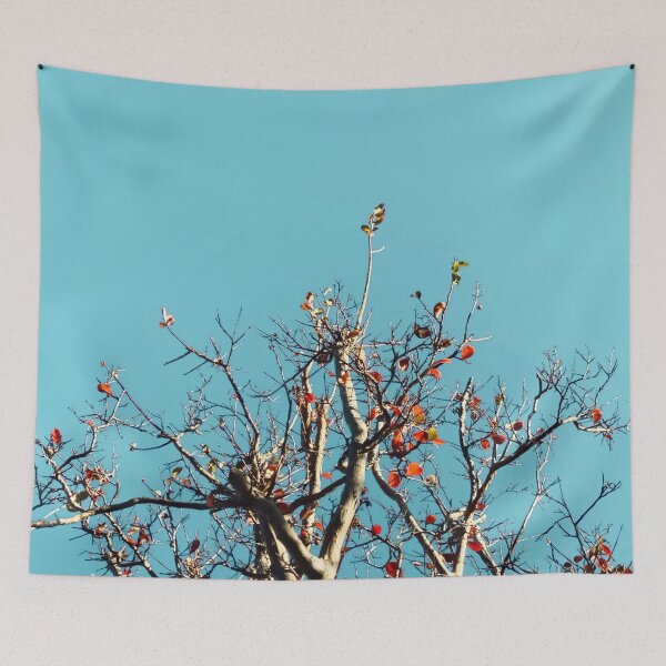 Item preview, Tree branch and orange autumn leaves with blue sky designed and sold by Mrvell.