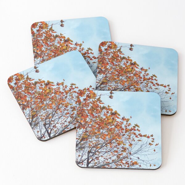 Item preview, Tree branch with orange autumn leaves and blue cloudy sky designed and sold by Mrvell.