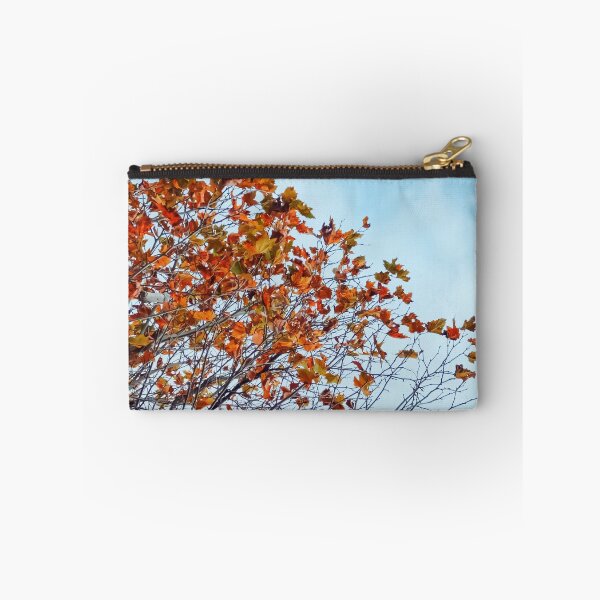 Item preview, Tree branch with orange autumn leaves and blue cloudy sky designed and sold by Mrvell.