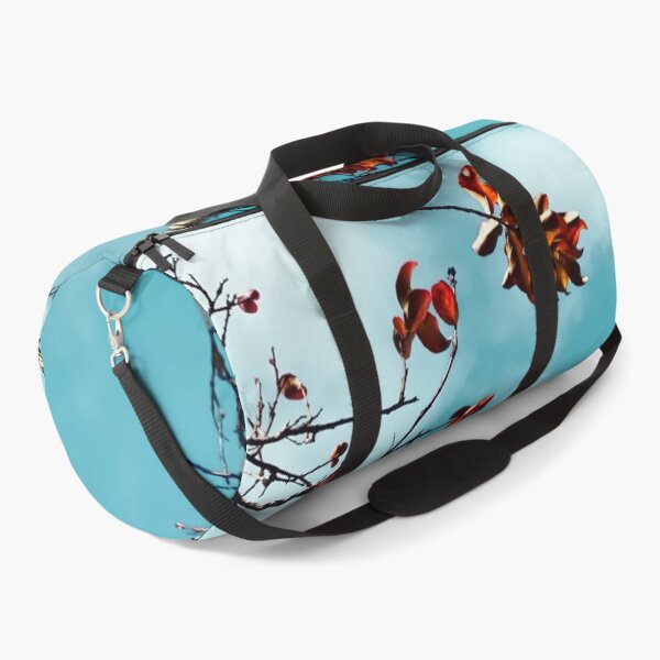 Item preview, Tree branch with orange autumn leaves and blue sky background designed and sold by Mrvell.