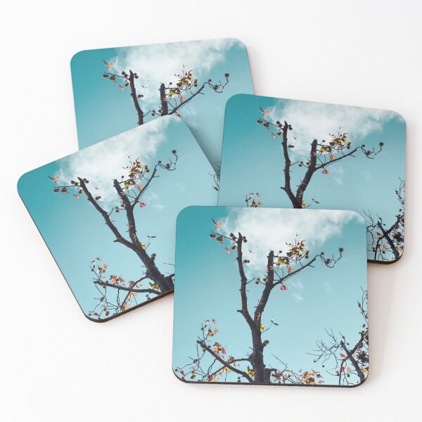 Item preview, Tree branch and orange autumn leaves with blue sky background designed and sold by Mrvell.