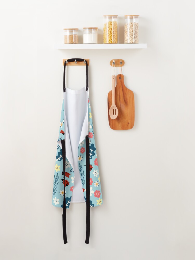 Alternate view of Spring meadow in bloom with ladybirds on blue background Apron