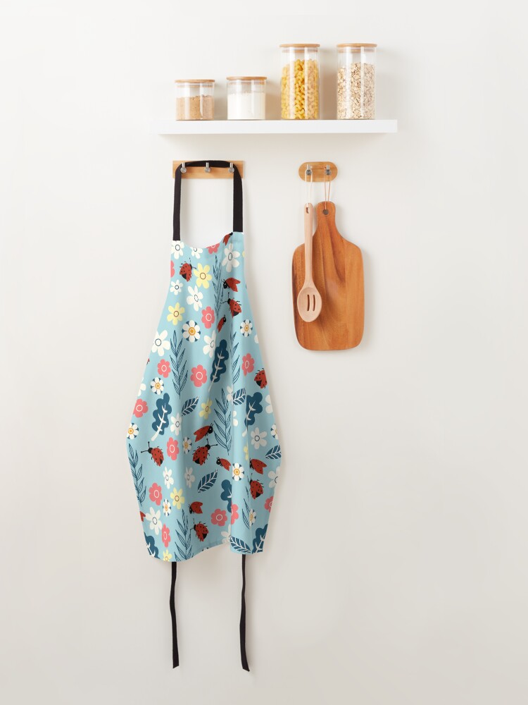Alternate view of Spring meadow in bloom with ladybirds on blue background Apron