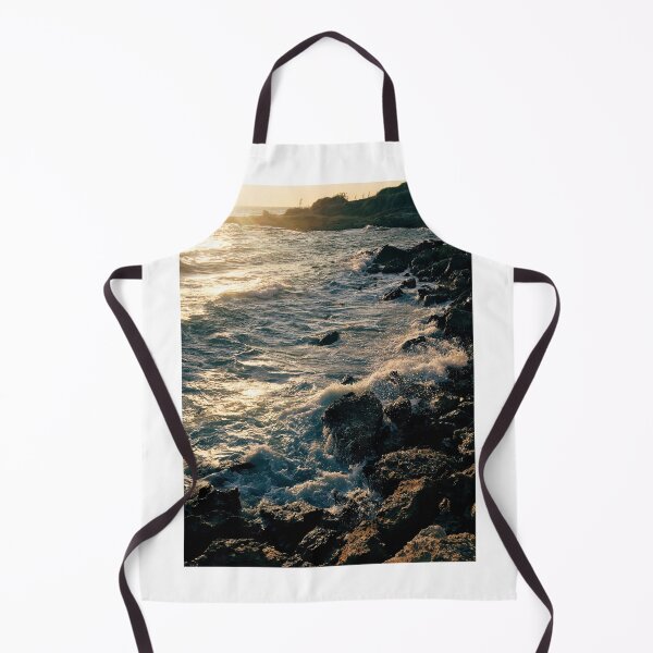 Item preview, Sunflare and storm waves of Cyprus sea on rocks designed and sold by The Full Cart.