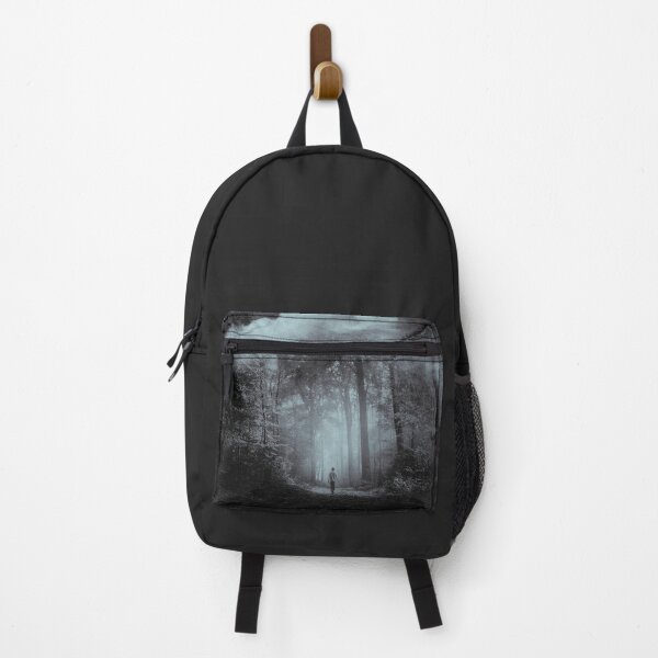 Item preview, elemental - man walking through moody surreal forest designed and sold by Dyrk Wyst Redbubble Shop.