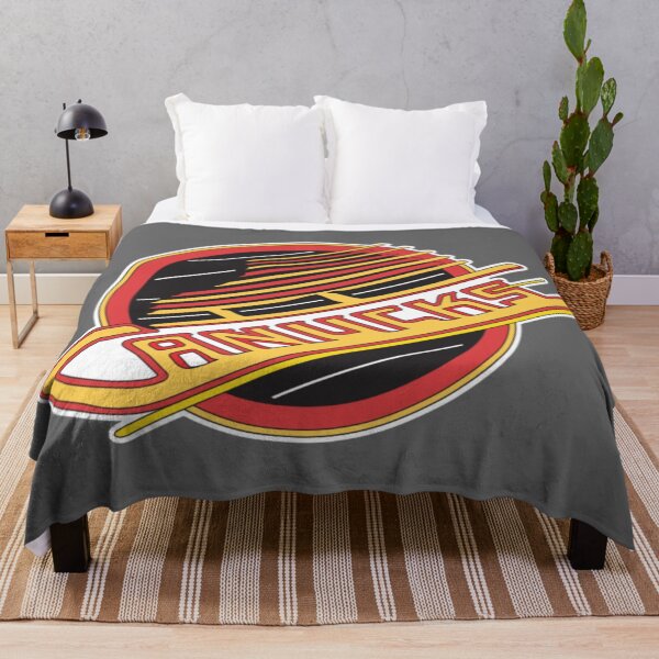 Vista previa del artículo con la obra «canucks retro patín de hockey inverso», diseñado y vendido por Hungry Hungry  Buffalo.