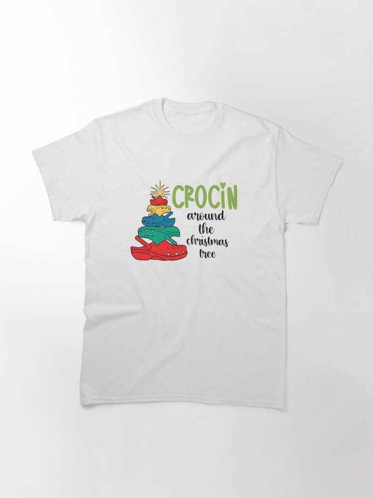 Discover crocin around the christmas tree Classic T-Shirt