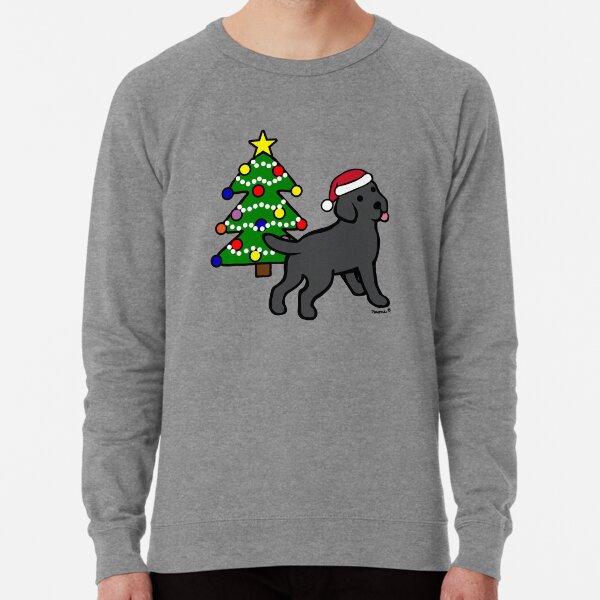Black Labrador Puppy and Christmas Tree