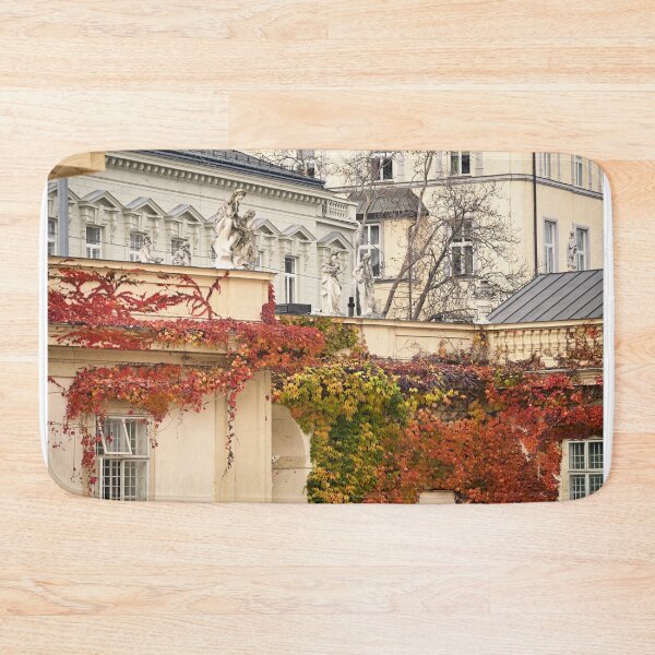 Item preview, old buildings covered with creeper colorful leaves in Vienna Austria designed and sold by goceris.