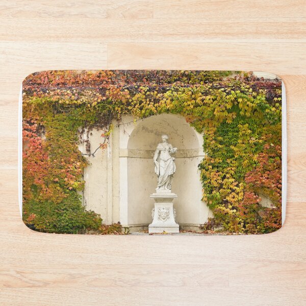Item preview, wall with creeper plant colorful leaves and statue in Vienna autumn season designed and sold by goceris.