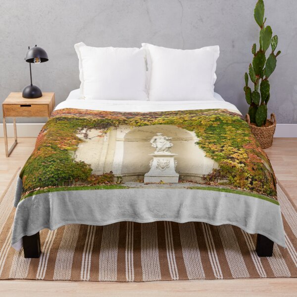 Item preview, wall with creeper plant colorful leaves and statue in Vienna autumn season designed and sold by goceris.