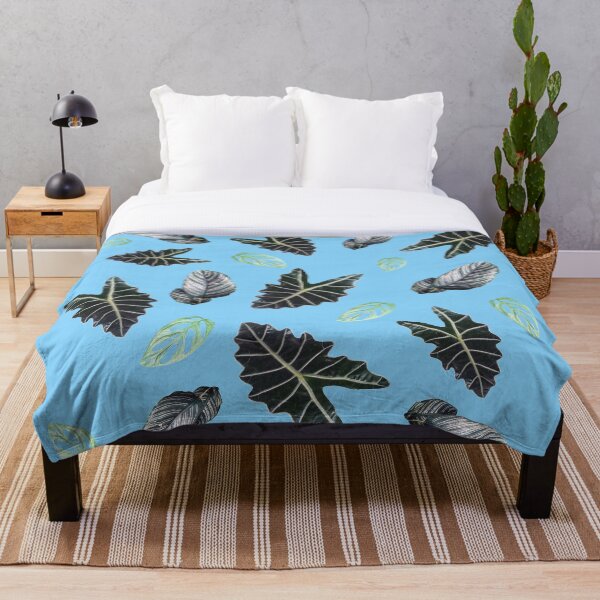 Aperçu de l'œuvre Motif de feuilles tropicales sur bleu créée et vendue par LittleAngy.