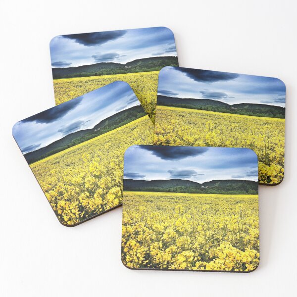 Item preview, Fields of gold yellow Rapeseed flowers mountain background designed and sold by Digibee.