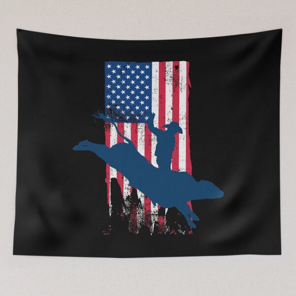 Item preview, Patriotic Bucking Bull Rider Cowboy with American Flag Background designed and sold by Gold Wings Tees.