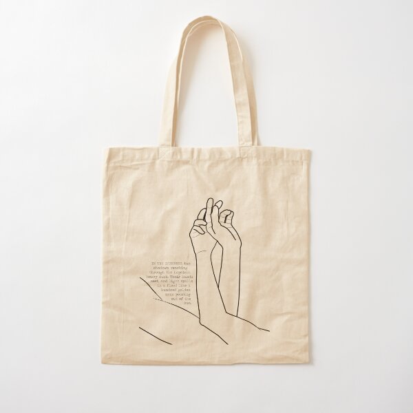 their hands meet, and light spills in a flood like a hundred golden urns pouring out of the sun. Cotton Tote Bag