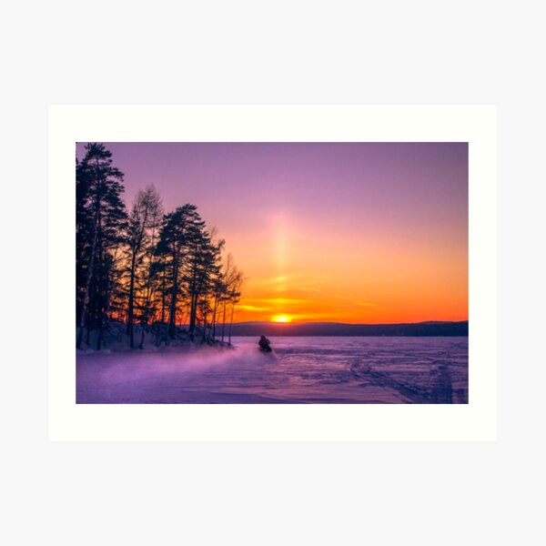 The snow mobile race toward the Sun pillar Art Print