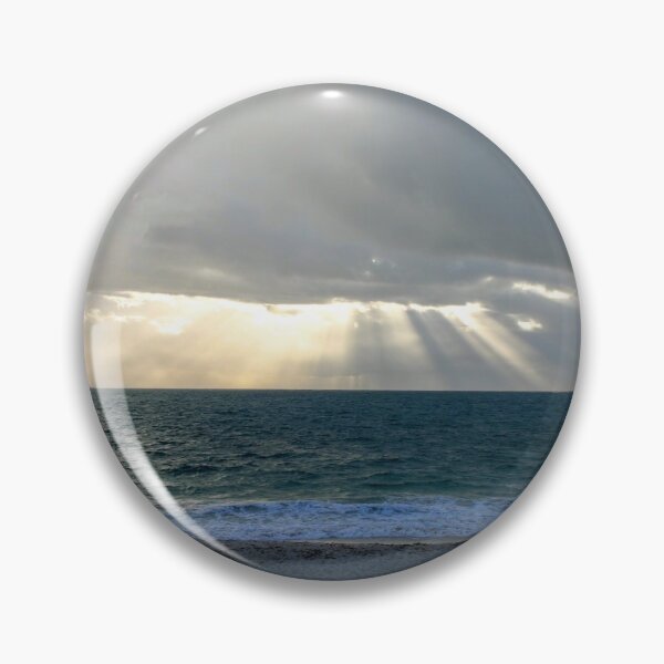 Item preview, Sun shining through clouds at beach designed and sold by eidann.
