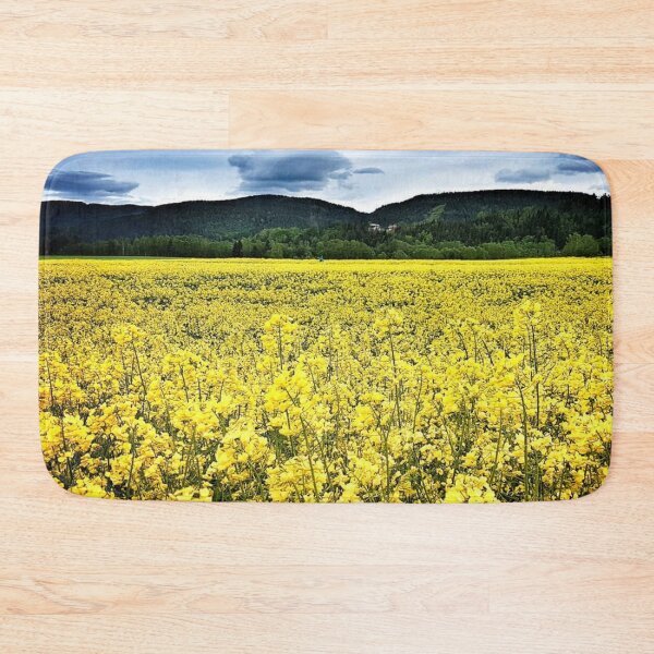 Item preview, Fields of gold yellow Rapeseed flowers mountain background designed and sold by Digibee.