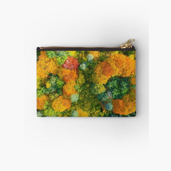 Item preview, Aerial top down view of vibrant colorful autumn forest designed and sold by Lukasz Szczepanski.