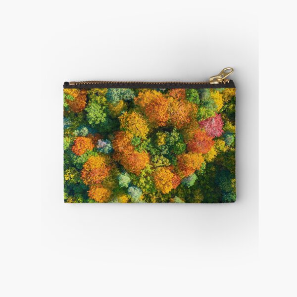 Item preview, Aerial top down view of vibrant colorful autumn forest designed and sold by Lukasz Szczepanski.