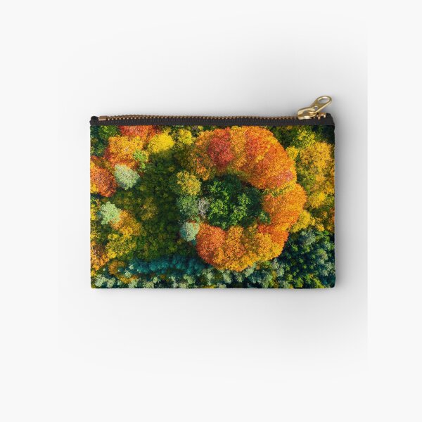 Item preview, Aerial top down view of vibrant colorful autumn forest designed and sold by Lukasz Szczepanski.