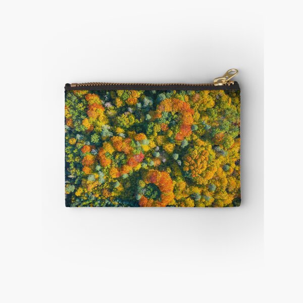 Item preview, Aerial top down view of vibrant colorful autumn forest designed and sold by Lukasz Szczepanski.