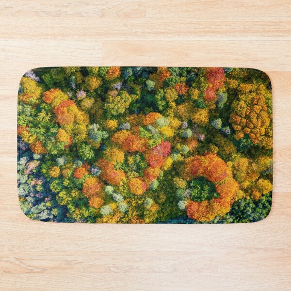 Item preview, Aerial top down view of vibrant colorful autumn forest designed and sold by Lukasz Szczepanski.