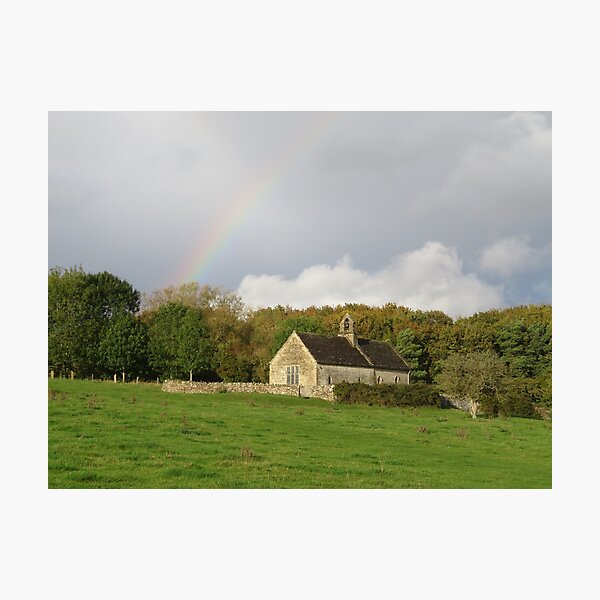 Rainbow over St Oswald's Church, Burford, UK Photographic Print