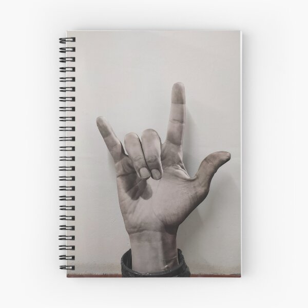 Item preview, Hand poking out of a basket making the "yo" gesture designed and sold by brambillasimone.