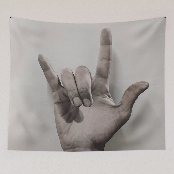Item preview, Hand poking out of a basket making the "yo" gesture designed and sold by brambillasimone.