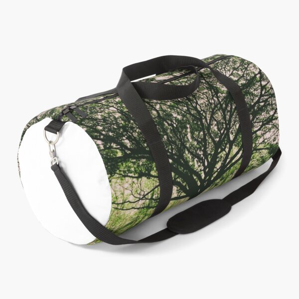 Item preview, Mythical and huge tree with smaller trees in the background designed and sold by MusaWander.