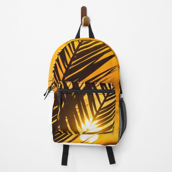 Item preview, Palm leaf over sunset sky background. designed and sold by krisgreenwood.