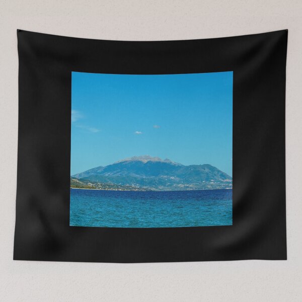 Item preview, Blue background with mountains and sea in greece designed and sold by ThebestArtshop.