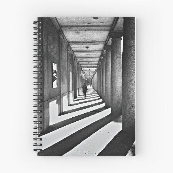 Item preview, Woman walking through shadows of columns in Copenhagen designed and sold by theendup.