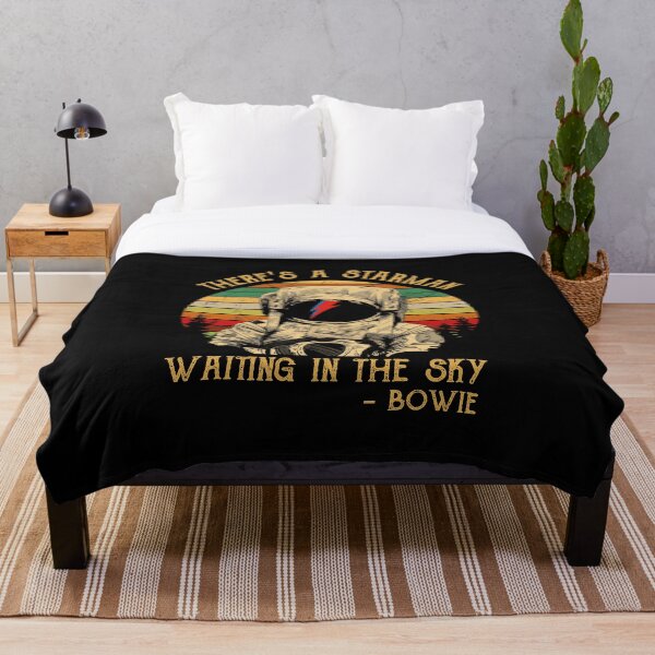 There's a starman waiting in the sky Throw Blanket