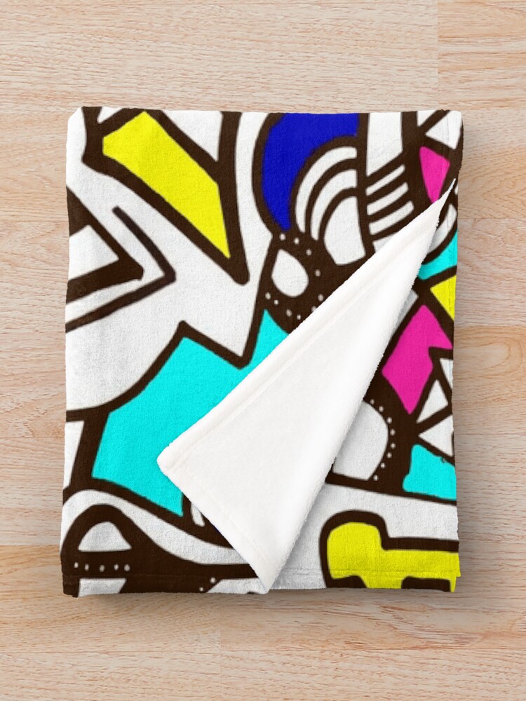 Aperçu 3 sur 6. Plaid avec l'œuvre pop art créée et vendue par lanaarma.