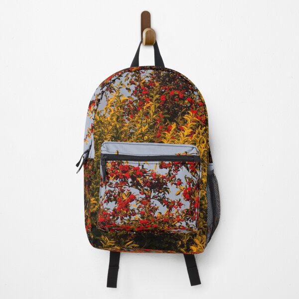 Item preview, Red Berries High in a Tree with a Winter Sky behind the tree designed and sold by Cameranick.