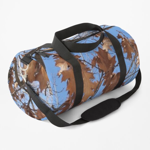 Dry autumn leaves on the tree Duffle Bag