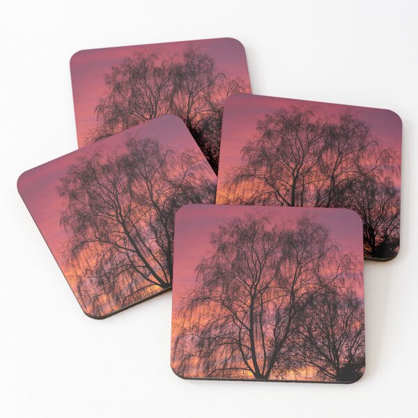 Item preview, Silhoutted trees against a vibrant sunset designed and sold by habilephoto.