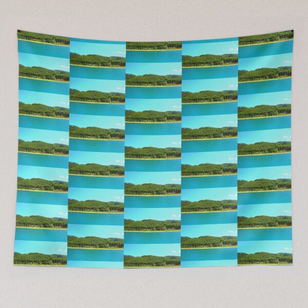 Item preview, Scenery at Gerosa Lake with light blue waters rippling in front of the green shore designed and sold by Kristina Drozd.