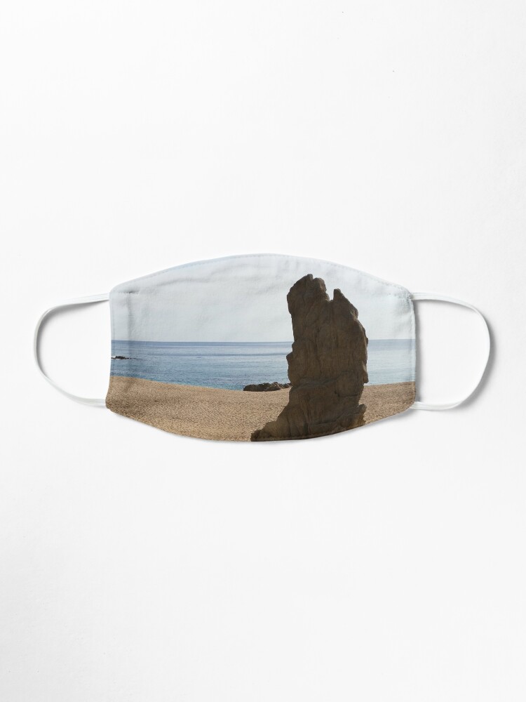 The Rock Standing Tall On A Soft Sandy Beach And Beyond Clear Blue Sea And Sky Mask By Tgedesigns Redbubble