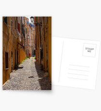 An alley in Alghero. Postcards