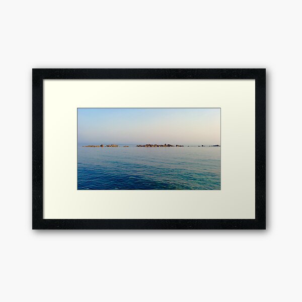 Rocks in Paphos Harbour Framed Art Print