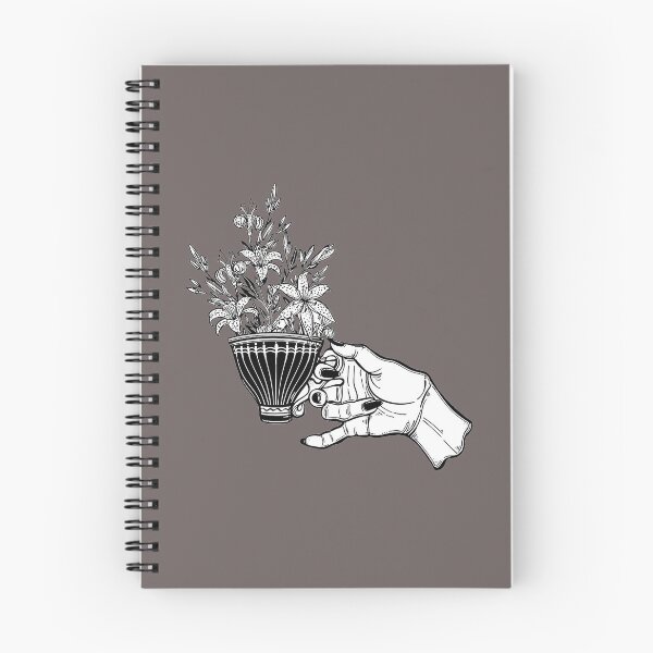 Item preview, Hand holding a magic tea or coffee cup with lily flowers designed and sold by ExocetMerch.