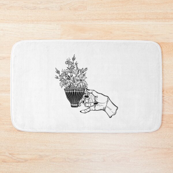 Item preview, Hand holding a magic tea or coffee cup with lily flowers designed and sold by ExocetMerch.