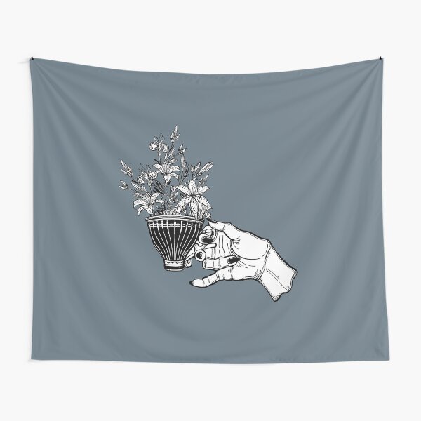 Item preview, Main tenant une tasse de thé ou de café magique avec des fleurs de lys designed and sold by ExocetMerch.