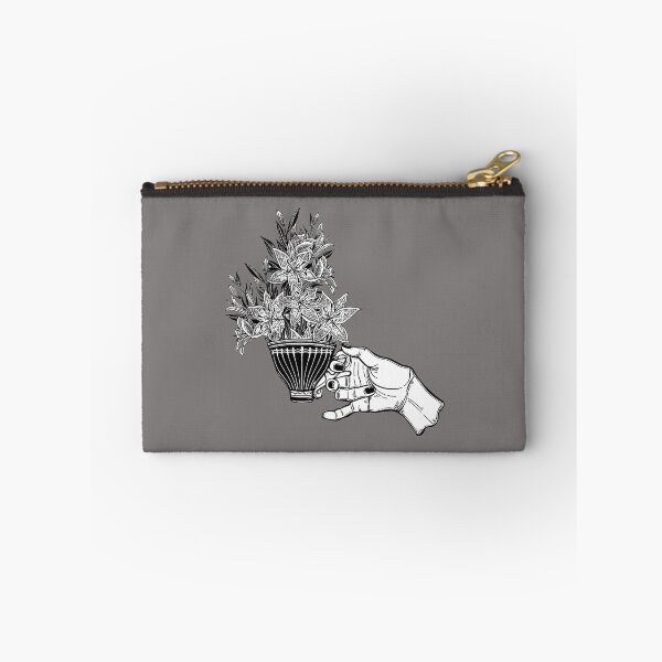 Item preview, Hand holding a tea or coffee cup with lily flowers designed and sold by ExocetMerch.