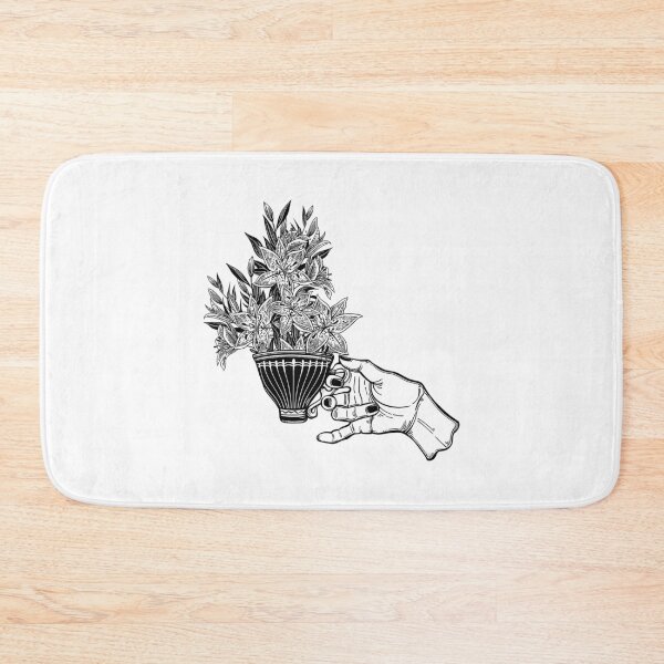 Item preview, Hand holding a tea or coffee cup with lily flowers designed and sold by ExocetMerch.