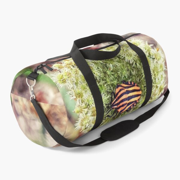 Item preview, Colorful orange and black zebra insect on carrot fruit designed and sold by NatureNature.